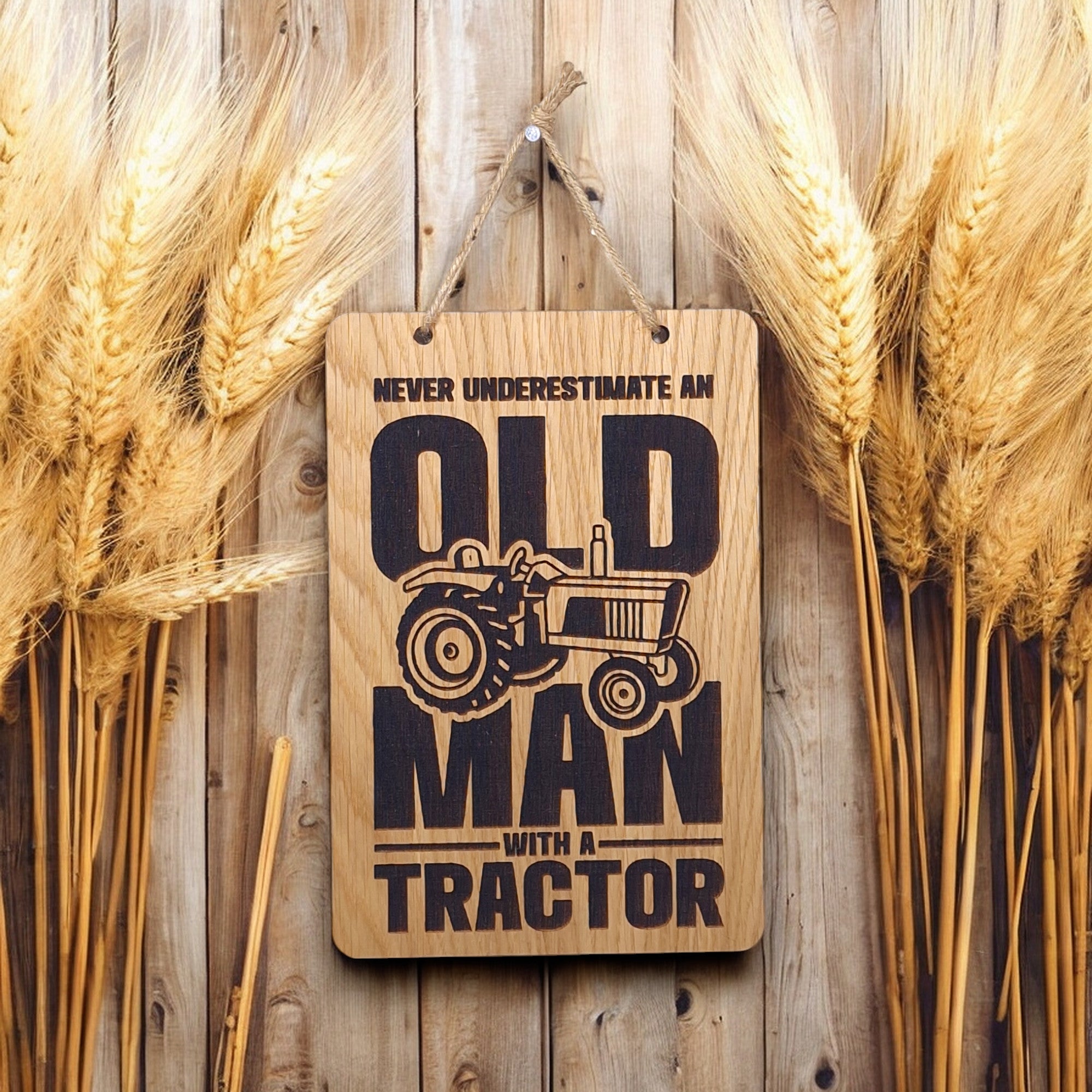 NeverUnderestimateAnOldManWithATractor-Photoroom.jpg