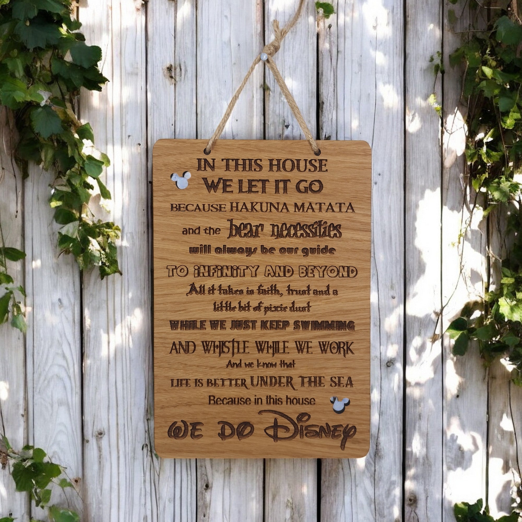 In This House We Do Disney wooden hanging sign