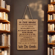 In This House We Do Geek wooden hanging sign.
